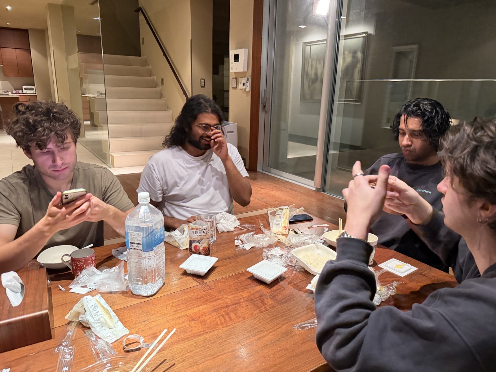 Late dinner around a wooden table